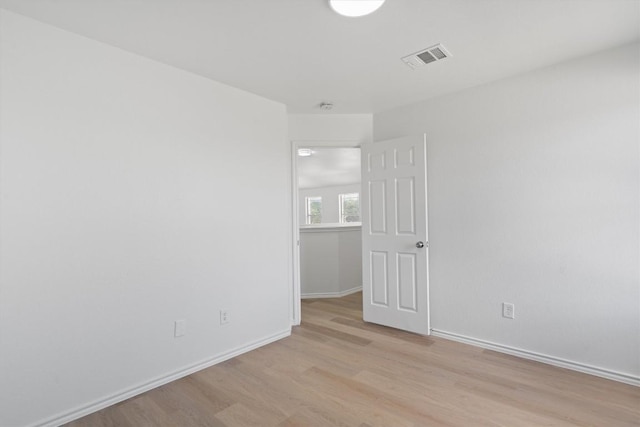 1816 Melissa Oaks Ln, Austin, TX 78744 - unfurnished room featuring light wood-type flooring and baseboards