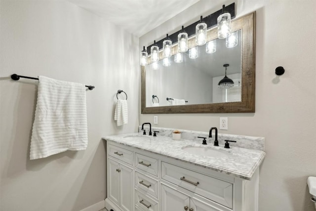 5530 US Highway 90a W, Shiner, TX 77984 - bathroom featuring double vanity and baseboards