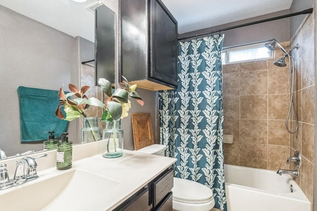 full bath with toilet, shower / bath combination with curtain, and vanity