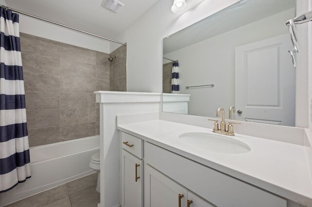 2324 Sawdust Dr, Georgetown, TX 78633 - bathroom with toilet, shower / bath combination with curtain, vanity, and tile patterned floors
