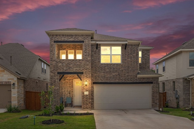 2324 Sawdust Dr, Georgetown, TX 78633 - traditional home with a garage, brick siding, and concrete driveway