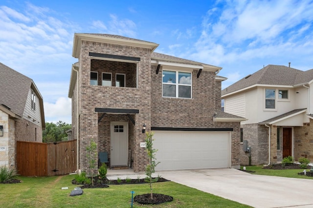 2324 Sawdust Dr, Georgetown, TX 78633 - view of front of property featuring an attached garage, concrete driveway, and brick siding
