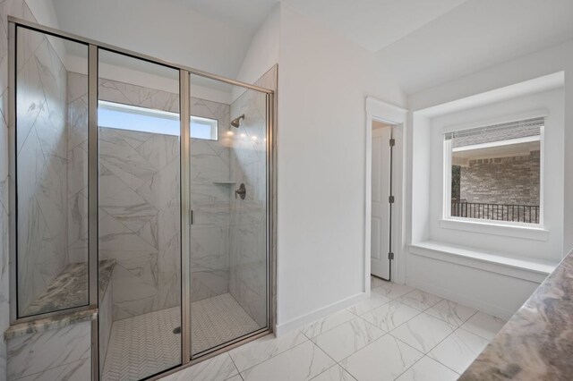 2324 Sawdust Dr, Georgetown, TX 78633 - full bath featuring marble finish flooring, a marble finish shower, and baseboards