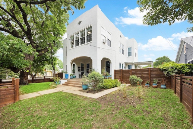 400 E 34th St, Austin, TX 78705 - rear view of house with stucco siding