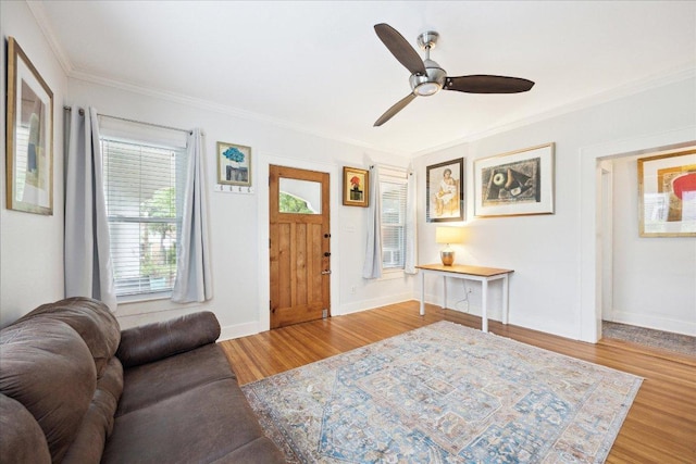 400 E 34th St, Austin, TX 78705 - foyer with ornamental molding, wood finished floors, a ceiling fan, and baseboards