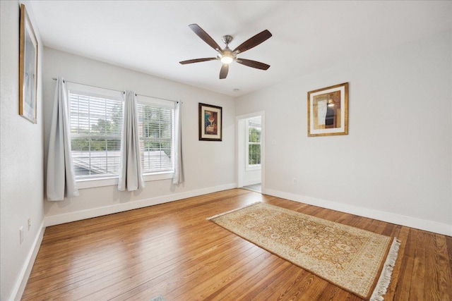 400 E 34th St, Austin, TX 78705 - empty room with baseboards, a ceiling fan, and wood finished floors