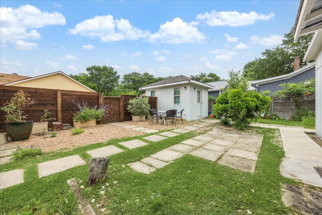 400 E 34th St, Austin, TX 78705 - fenced backyard with a patio area