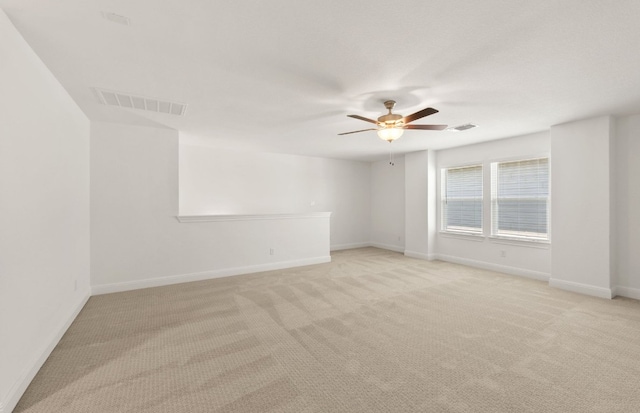 16804 Santiaguillo Trce, Manor, TX 78653 - unfurnished room featuring a ceiling fan and light colored carpet