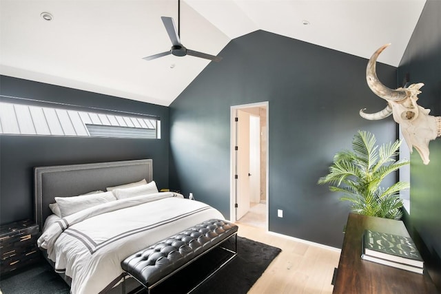 404 W Milton St, Austin, TX 78704 - bedroom with wood finished floors, high vaulted ceiling, ensuite bathroom, and a ceiling fan
