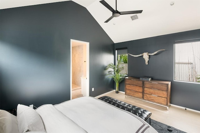 404 W Milton St, Austin, TX 78704 - bedroom with baseboards, high vaulted ceiling, and ensuite bathroom