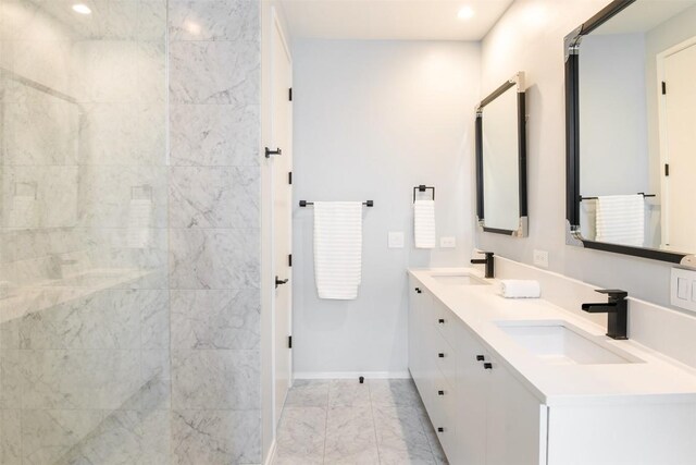 404 W Milton St, Austin, TX 78704 - full bathroom with marble finish flooring, baseboards, double vanity, and recessed lighting