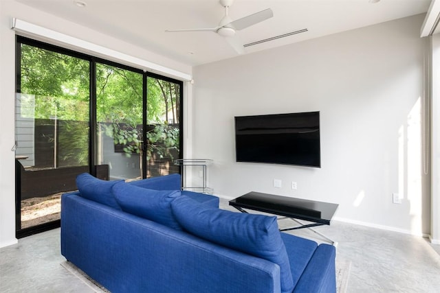 404 W Milton St, Austin, TX 78704 - living room with finished concrete floors and a ceiling fan