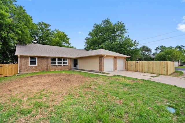 1800 Nicole Cir, Round Rock, TX 78664 - single story home featuring an attached garage, brick siding, and driveway