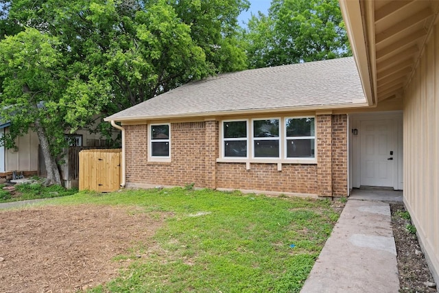 1800 Nicole Cir, Round Rock, TX 78664 - view of front of house with brick siding and roof with shingles