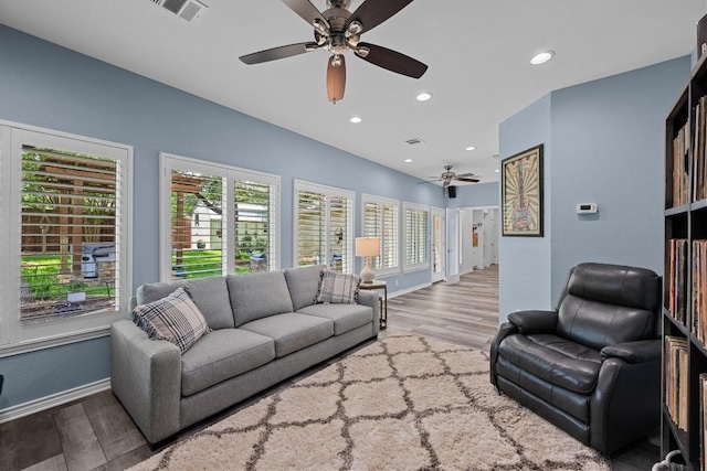 906 Texas Trl, Austin, TX 78737 - living room featuring ceiling fan, wood finished floors, recessed lighting, and baseboards