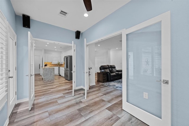 906 Texas Trl, Austin, TX 78737 - foyer featuring ceiling fan, light wood-style floors, and recessed lighting