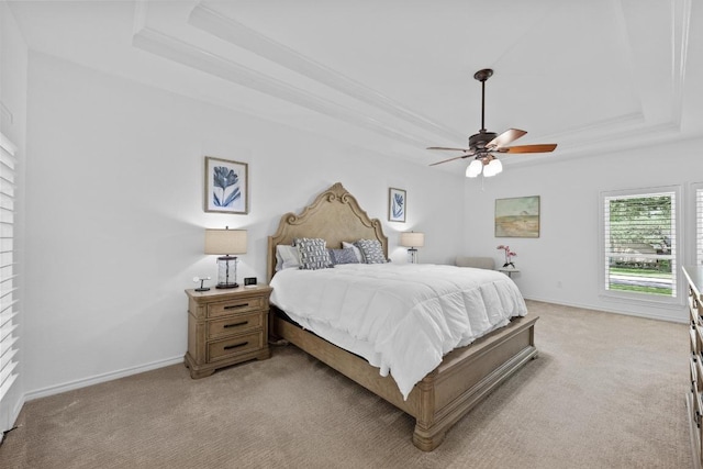 906 Texas Trl, Austin, TX 78737 - bedroom with a tray ceiling, light carpet, baseboards, a ceiling fan, and ornamental molding