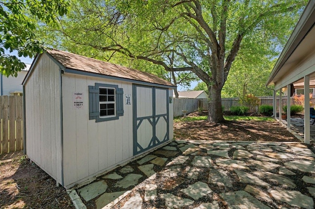 11707 Ruffed Grouse Dr, Austin, TX 78758 - view of shed with a fenced backyard