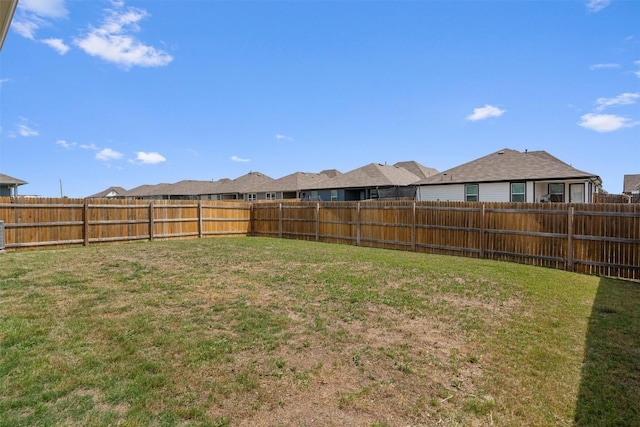 view of yard featuring a residential view