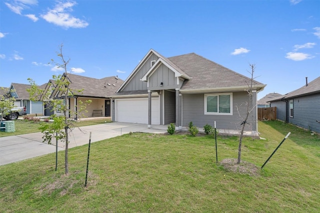 view of front of home featuring board and batten siding, driveway, and a garage