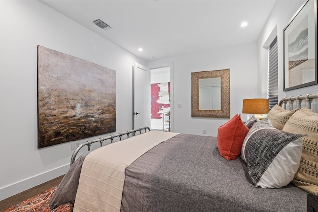2800 Del Curto Rd Unit 9, Austin, TX 78704 - bedroom with wood finished floors, recessed lighting, and baseboards