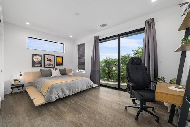 2800 Del Curto Rd Unit 9, Austin, TX 78704 - bedroom featuring wood finished floors, multiple windows, recessed lighting, access to outside, and an office area