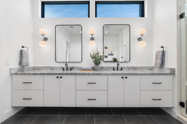 2800 Del Curto Rd Unit 9, Austin, TX 78704 - full bathroom featuring double vanity, a shower stall, and tile patterned flooring