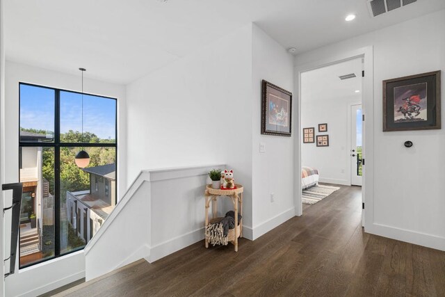 2800 Del Curto Rd Unit 9, Austin, TX 78704 - hallway with wood finished floors and recessed lighting