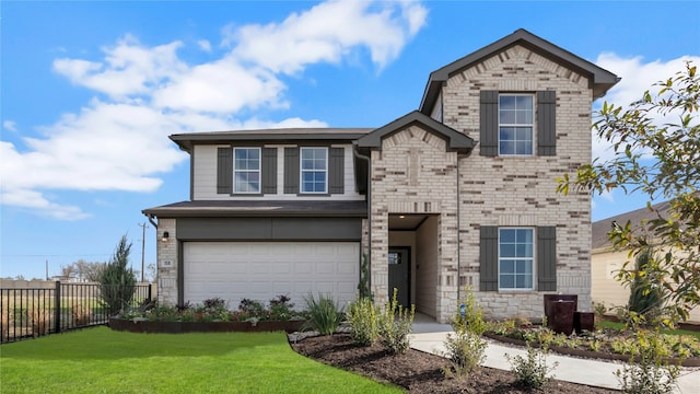 194 Inks Ln, Kyle, TX 78640 - view of front of home featuring an attached garage, stone siding, driveway, and brick siding
