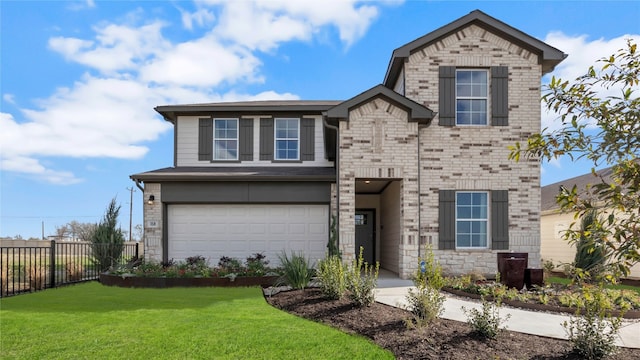 194 Inks Ln, Kyle, TX 78640 - view of front of house featuring an attached garage, stone siding, brick siding, and concrete driveway