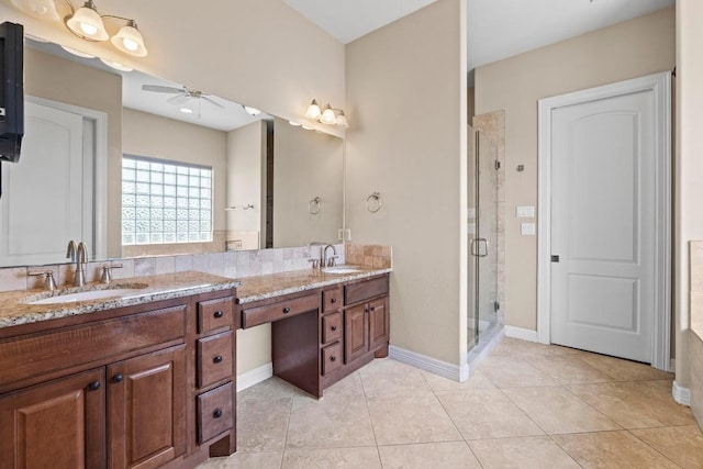 8293 Lime Creek Rd, Volente, TX 78641 - full bath featuring ceiling fan, double vanity, a shower stall, and tile patterned floors