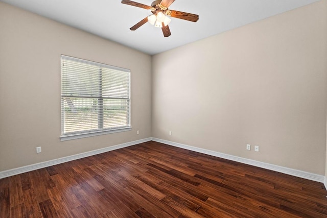 8293 Lime Creek Rd, Volente, TX 78641 - empty room featuring baseboards, dark wood-type flooring, and a ceiling fan