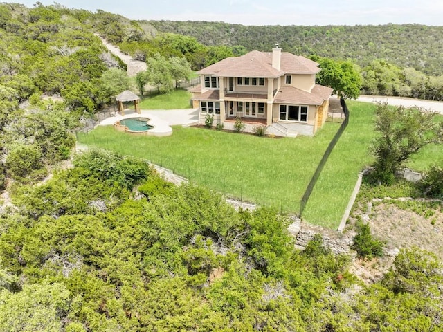 8293 Lime Creek Rd, Volente, TX 78641 - view of subject property with a heavily wooded area