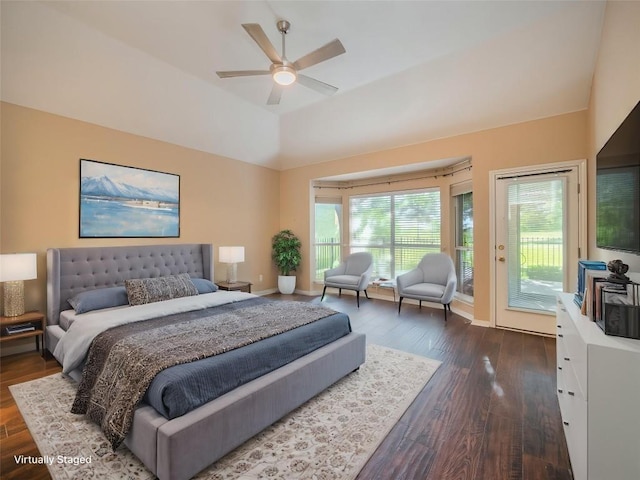 11029 Ballybunion Pl, Austin, TX 78747 - bedroom with access to exterior, vaulted ceiling, dark wood finished floors, and baseboards