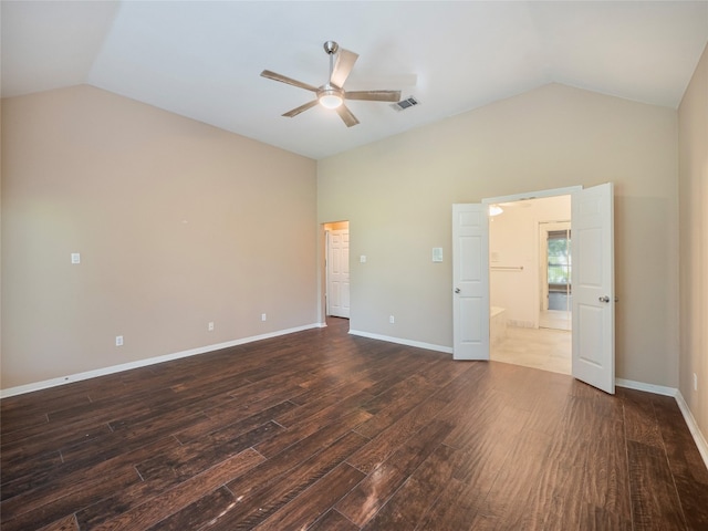 11029 Ballybunion Pl, Austin, TX 78747 - unfurnished bedroom with lofted ceiling, dark wood-style floors, a ceiling fan, and baseboards