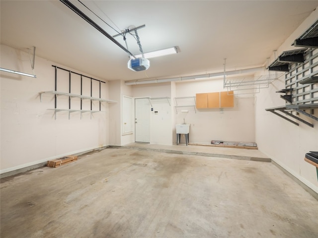 11029 Ballybunion Pl, Austin, TX 78747 - garage featuring a garage door opener and a sink