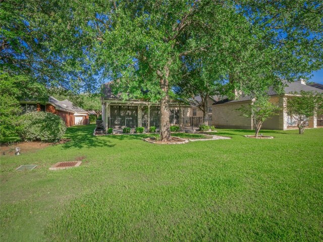 11029 Ballybunion Pl, Austin, TX 78747 - view of grassy yard with a sunroom