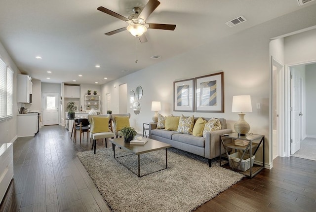 532 Emory Crossing Blvd, Hutto, TX 78634 - living area with ceiling fan, dark wood-style floors, baseboards, and recessed lighting