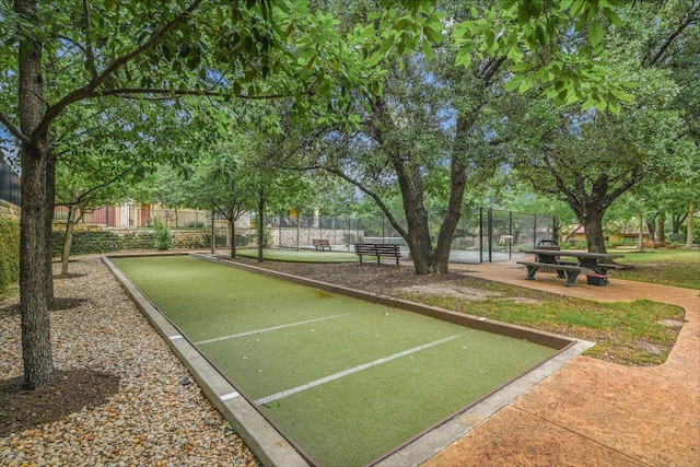 102 Bella Toscana Ave Unit 1306, Lakeway, TX 78734 - view of property's community with a bocce ball area and fence