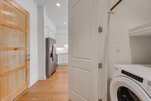 102 Bella Toscana Ave Unit 1306, Lakeway, TX 78734 - laundry area with washer / dryer, light wood-type flooring, and recessed lighting