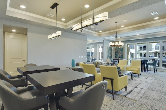 102 Bella Toscana Ave Unit 1306, Lakeway, TX 78734 - dining space with a raised ceiling, a chandelier, ornamental molding, recessed lighting, and light colored carpet