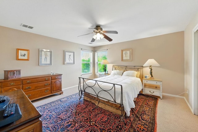 2111 Marcus Abrams Blvd, Austin, TX 78748 - bedroom featuring baseboards, light carpet, and ceiling fan