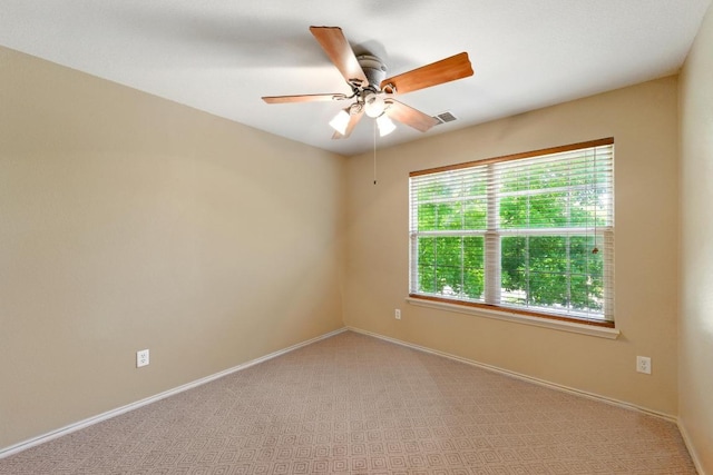 2111 Marcus Abrams Blvd, Austin, TX 78748 - spare room with baseboards, carpet floors, and ceiling fan