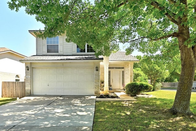 2111 Marcus Abrams Blvd, Austin, TX 78748 - view of front of house with an attached garage, concrete driveway, and a shingled roof