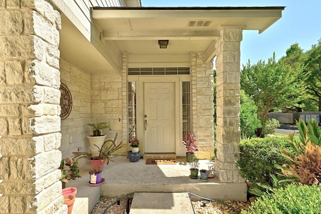 2111 Marcus Abrams Blvd, Austin, TX 78748 - view of exterior entry featuring stone siding and fence