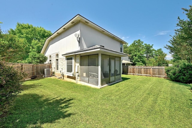 2111 Marcus Abrams Blvd, Austin, TX 78748 - rear view of property with cooling unit and a sunroom