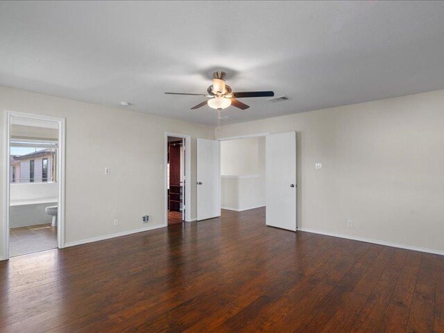 200 Karrie Dr, Kyle, TX 78640 - unfurnished room with a ceiling fan and wood finished floors