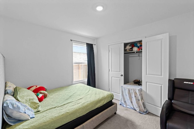 112 Montego St, Hutto, TX 78634 - bedroom featuring light colored carpet and a closet