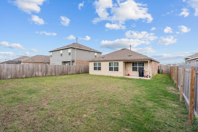 112 Montego St, Hutto, TX 78634 - rear view of property with a patio