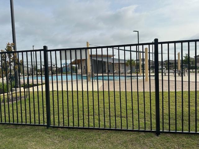 112 Montego St, Hutto, TX 78634 - gate with a community pool